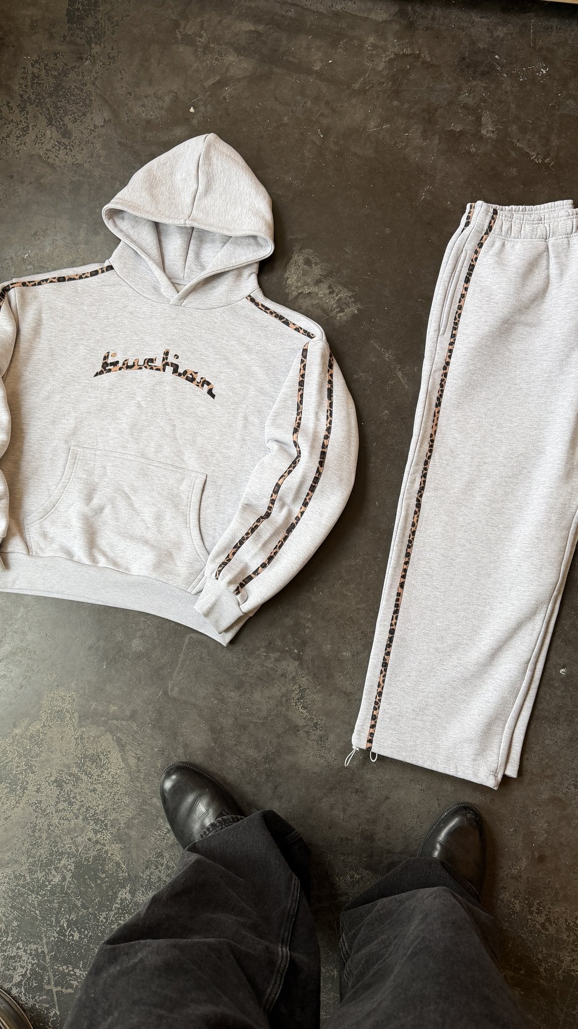 Buchan Cheetah Hoodie – flat lay with matching pants